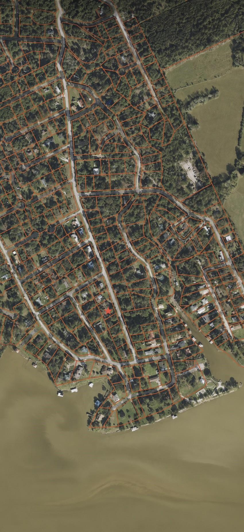 Image 4: Aerial view of the Trinity Cove subdivision near L