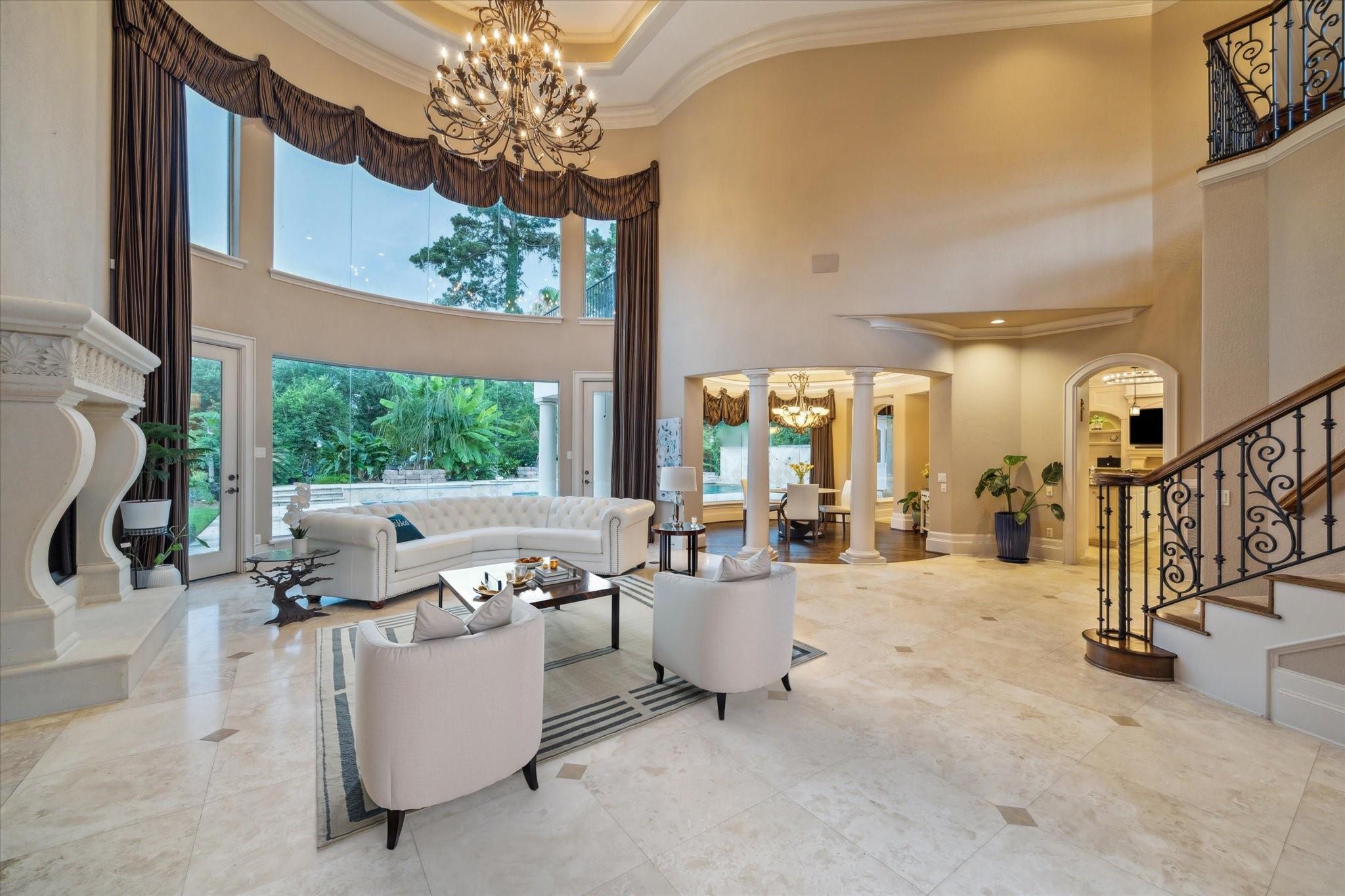 Image 4: This Grand Room features a 2 story curved wall of