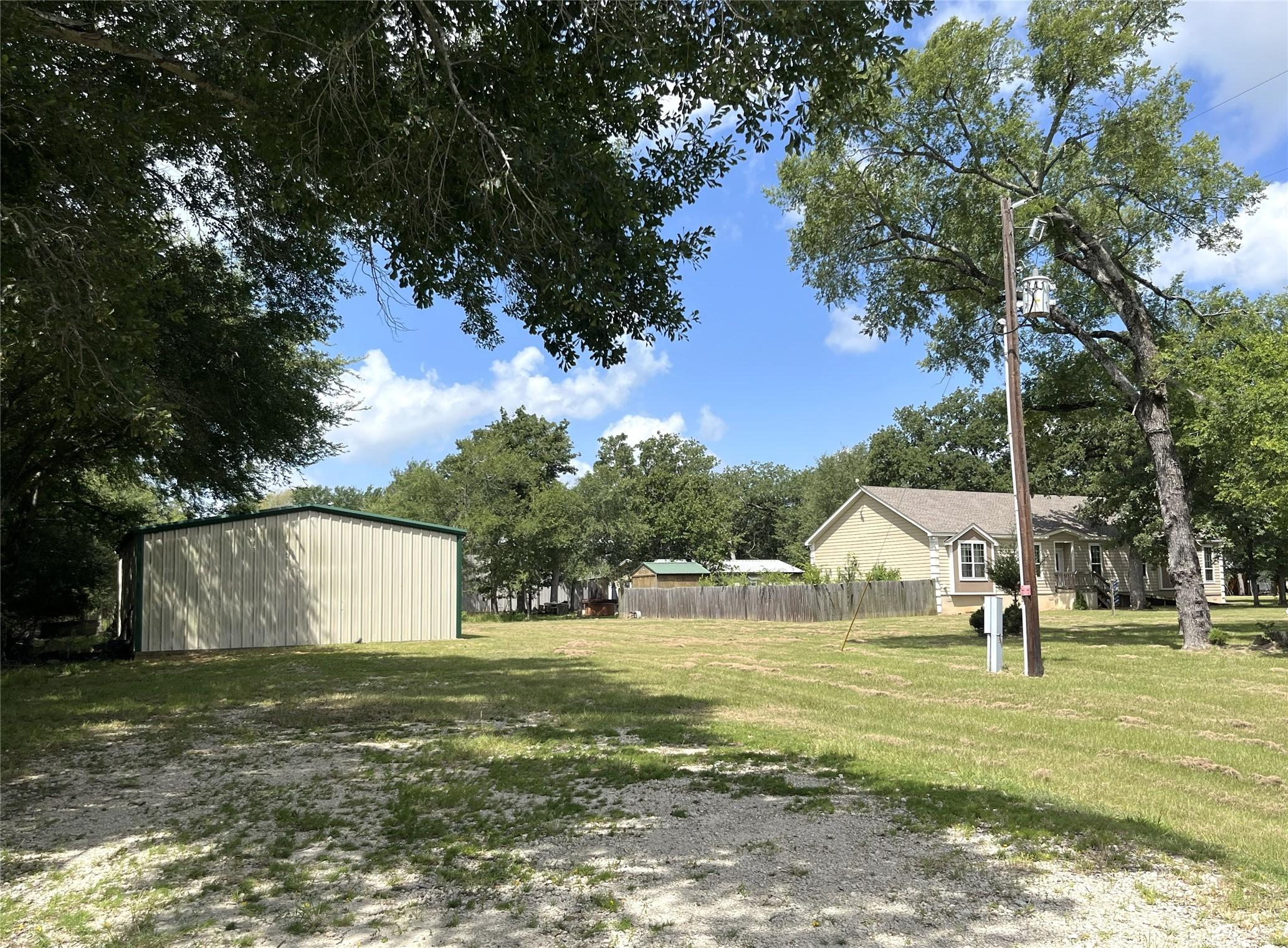 Image 3: Side Yard View from Shop