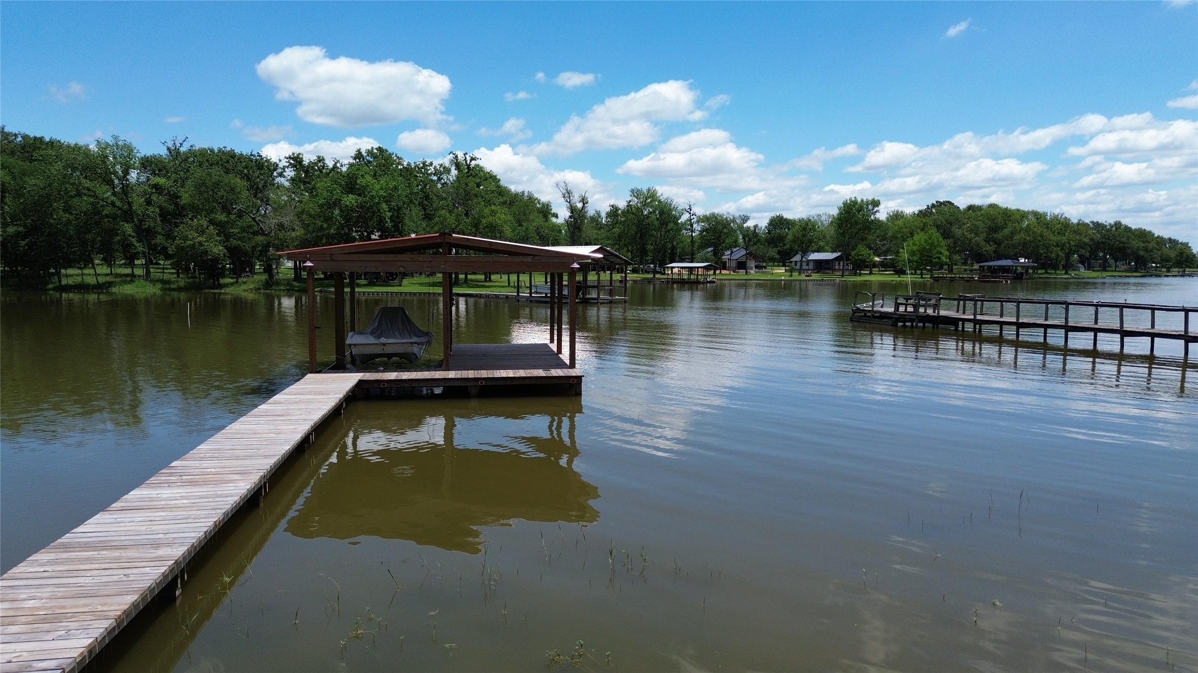 Image 2: Walkway and Boat House