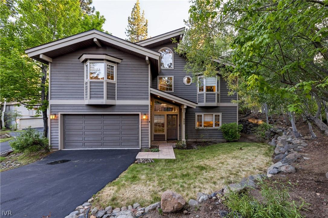 Image 1: Charming home nestled in a quiet gated community j