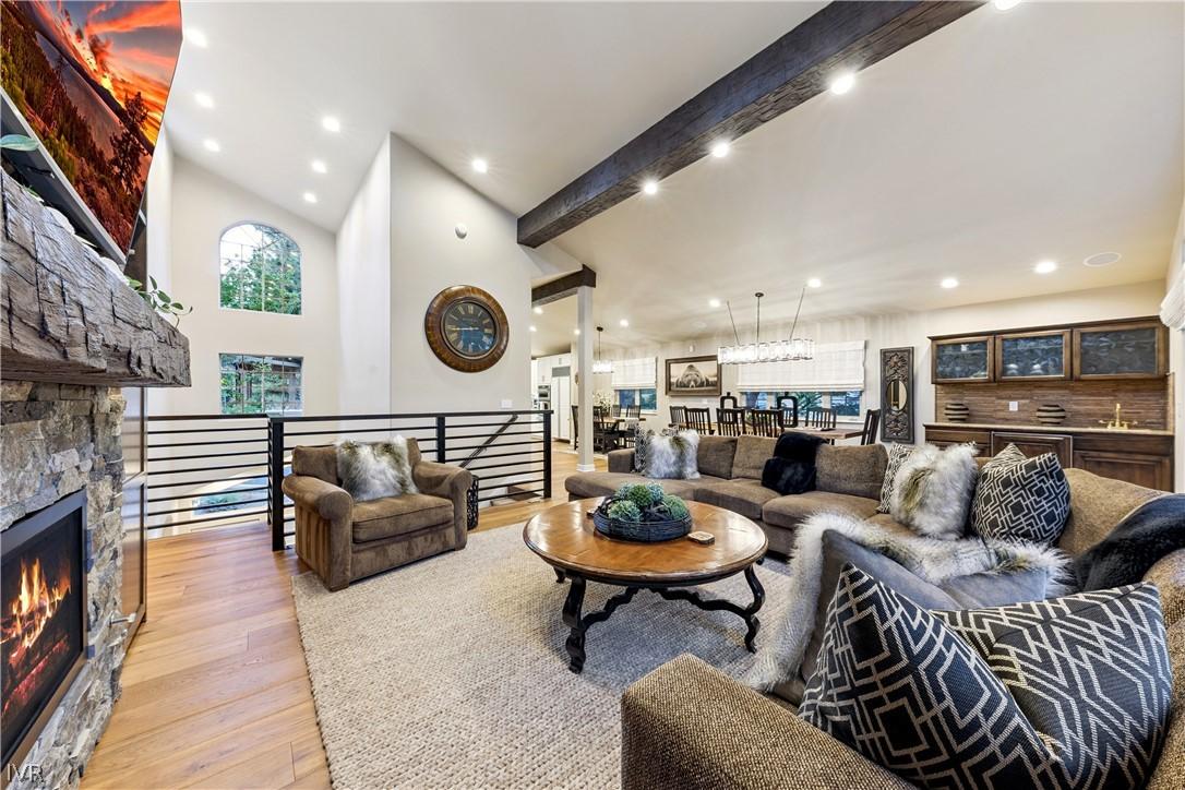 Image 2: Spacious great room with soaring ceilings that flo
