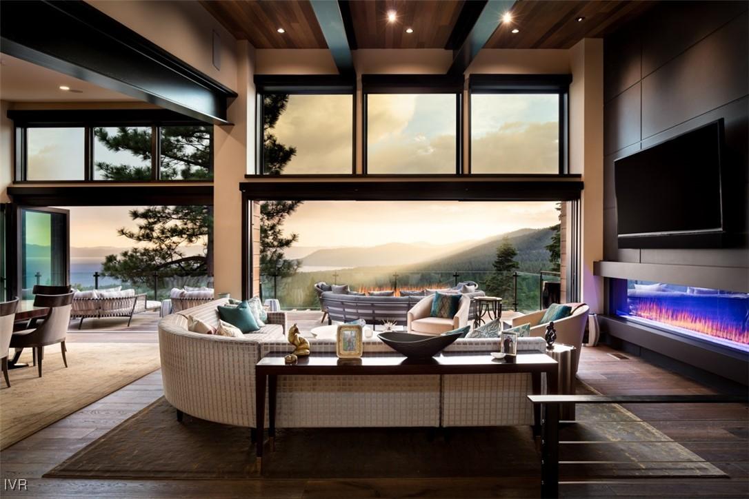 Image 1: Great Room opens to main deck.