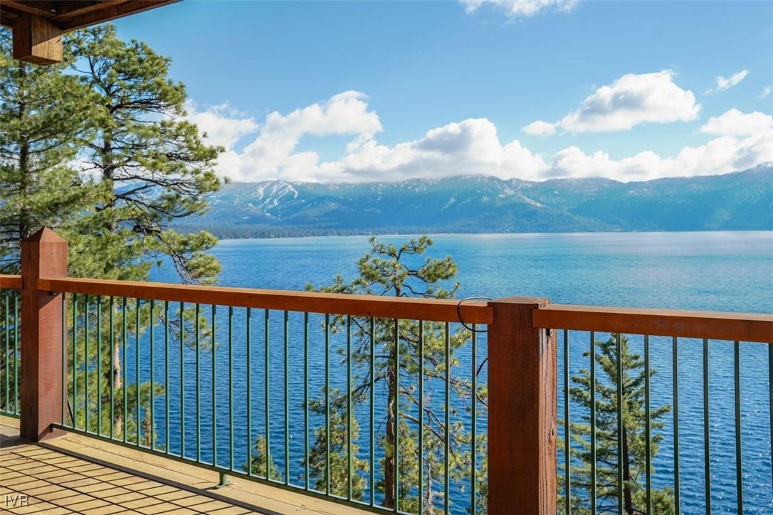 Image 1: Expansive deck overlooking Tahoe&rsquo;s cobalt waters&mdash