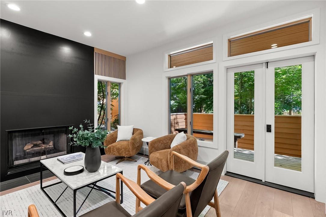 Image 3: Family Room with Deck Access