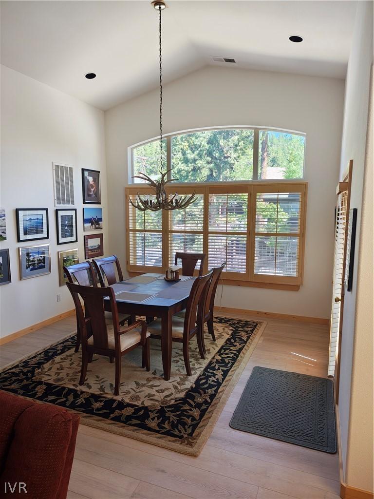 Image 3: Dining area portion of great room.