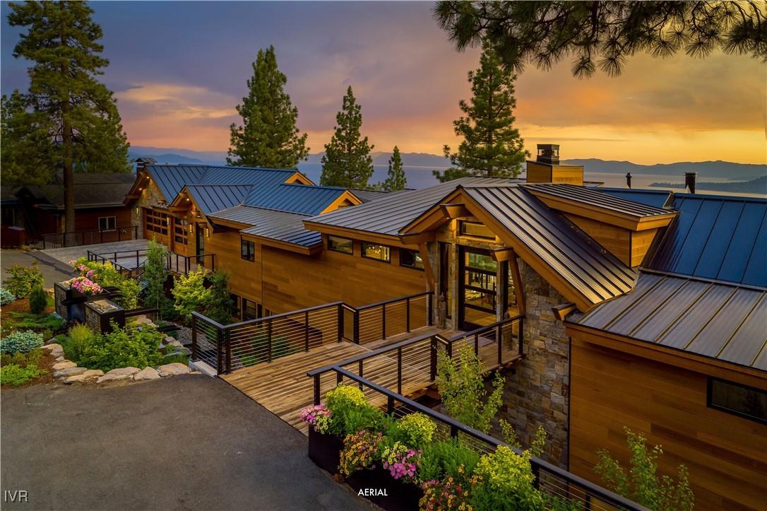 Image 2: Aerial Front Exterior,street to street .84 acre pa