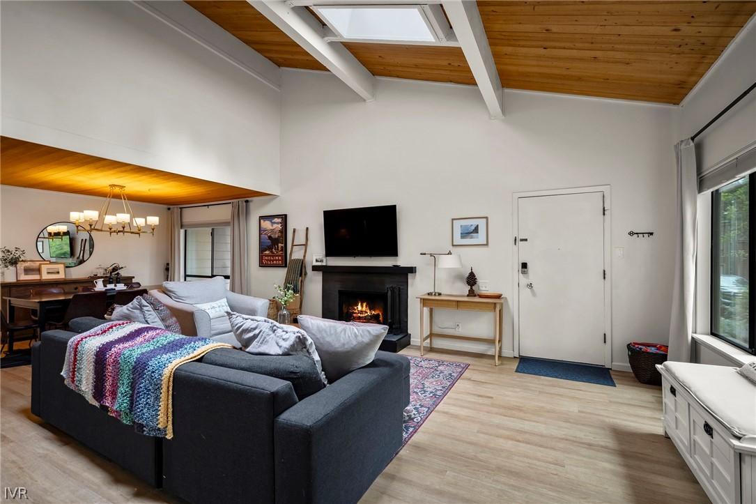 Image 3: Large great room on the entry level includes a woo
