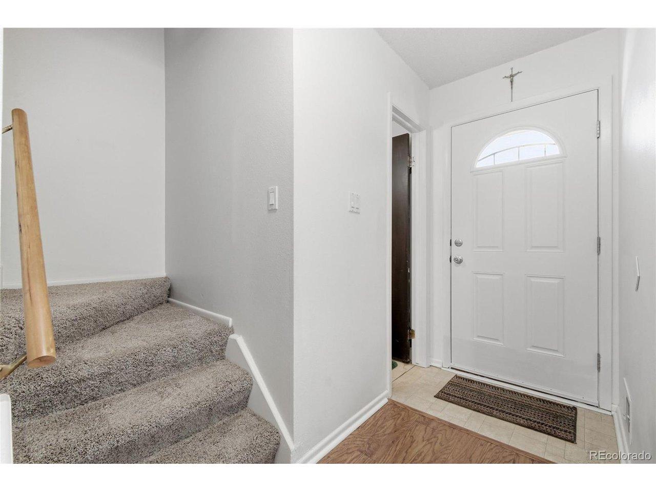 Image 2: The 1/2 bath is right by the entrance