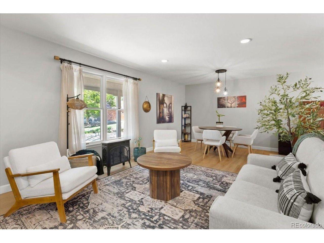Image 2: Gorgeous formal living room greets you upon walking through front door and entry way.