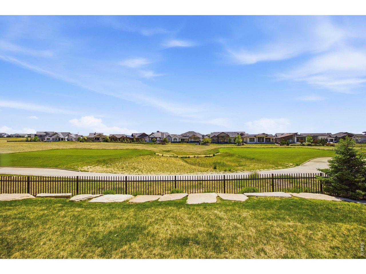 Image 4: Backyard overlooks golf course Image 4: Backyard overlooks golf course