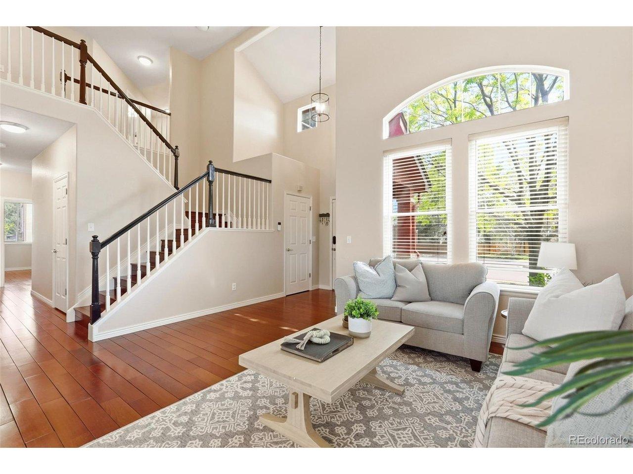 Image 2: Living Room with vaulted staircase Image 2: Living Room with vaulted staircase