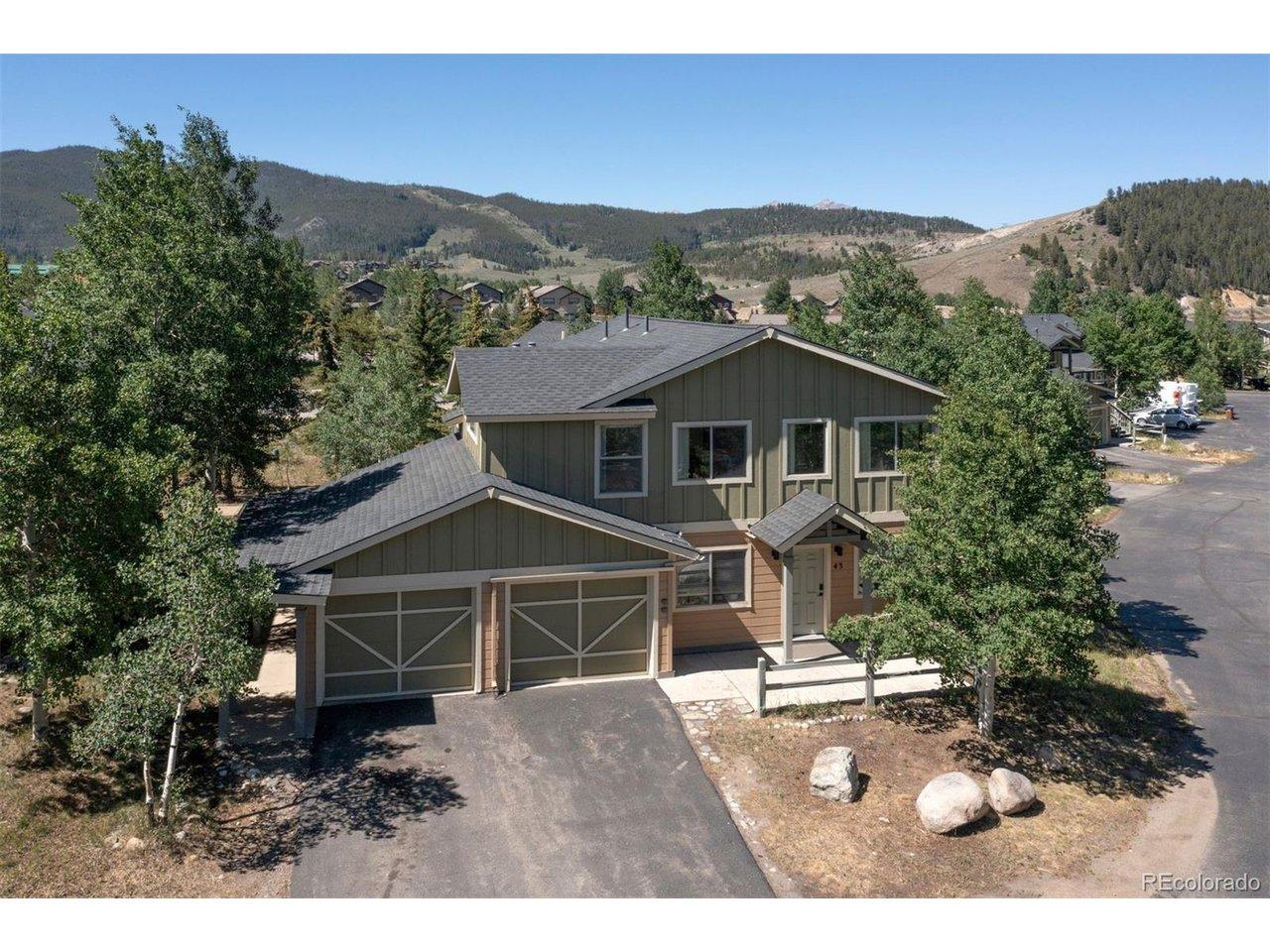 Image 1: This property is the top floor of this duplex-style condominium. One car garage & entry on the left side.