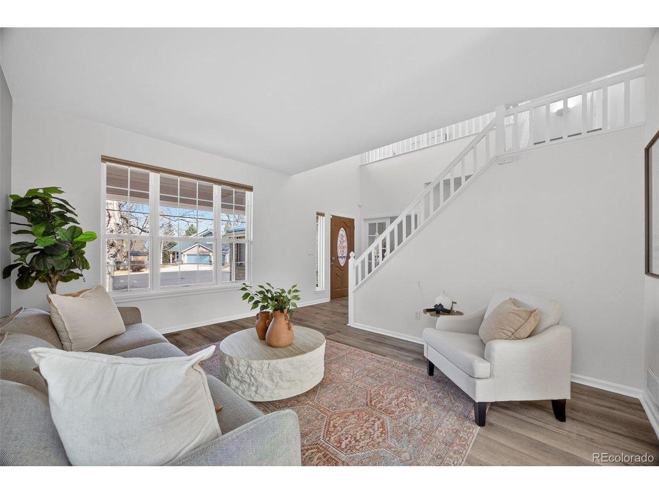 Image 4: Open and Inviting from the moment you walk into this freshly painted home