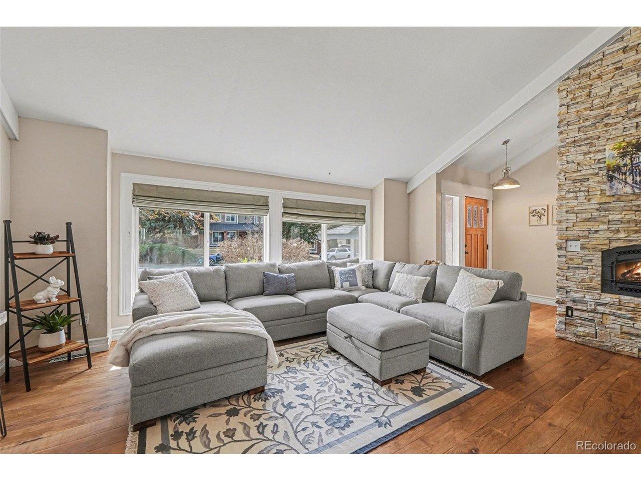 Image 4: Living Room w/Stacked Stone Gas Fireplace Image 4: Living Room w/Stacked Stone Gas Fireplace