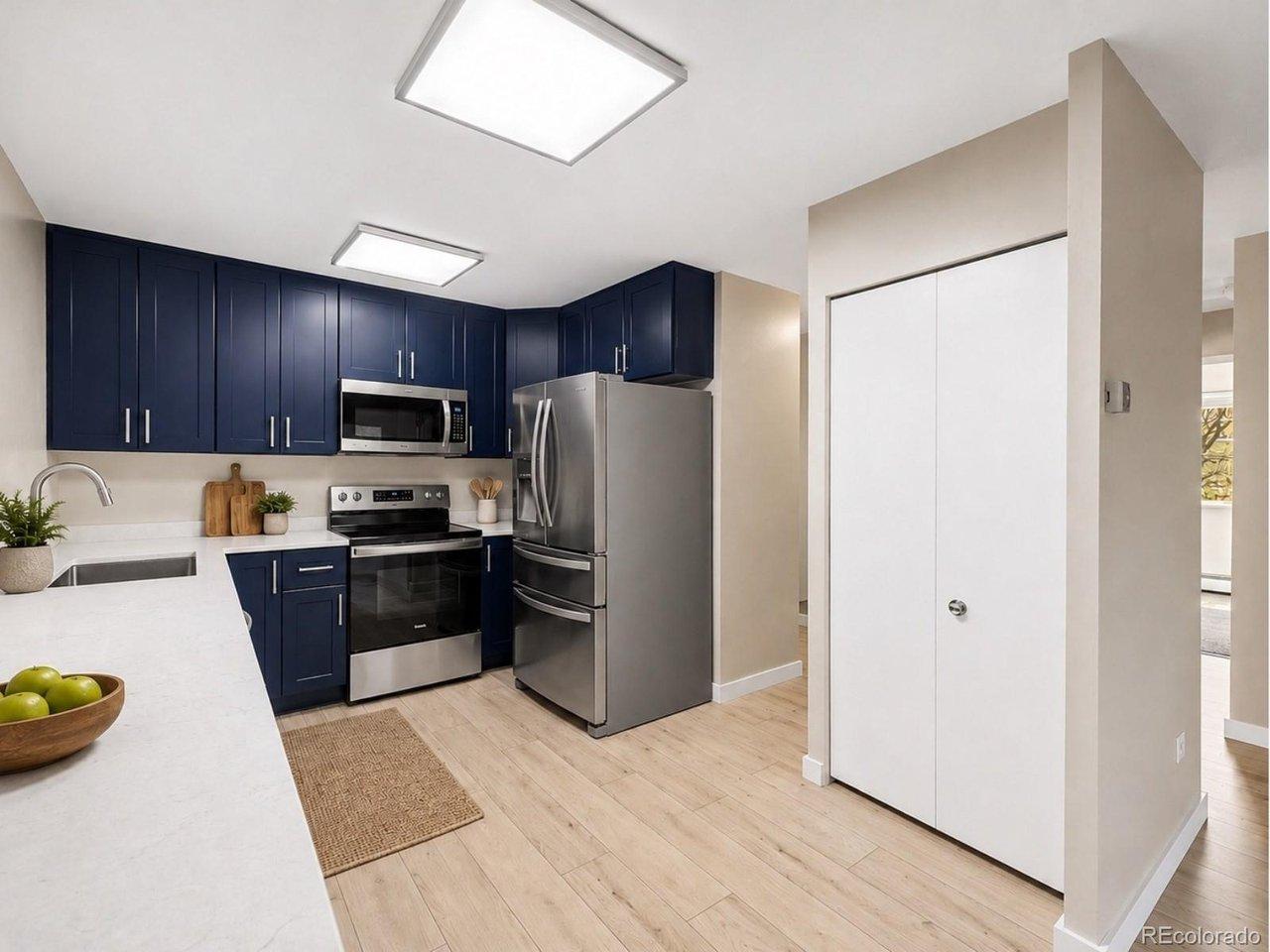 Image 3: Virtually Staged and NEW Cabinets, Quartz Counters and Appliances!