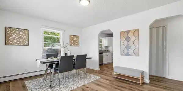 Image 4: As you enter the home into the entryway and dining room, you will find new luxury vinyl flooring throughout, all-new interior paint including the ceilings and trim.