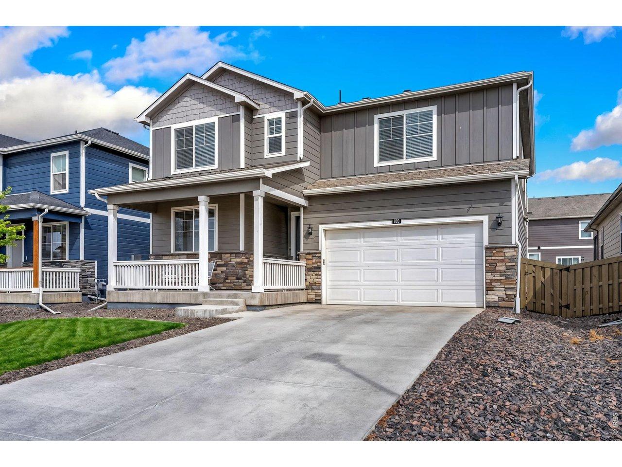 Image 2: Large driveway & 2 car garage! South facing! Lawn photos have been enhanced to showcase spring/summer potential. Image 2: Large driveway & 2 car garage! South facing! Lawn photos have been enhanced to showcase spring/summer potential.