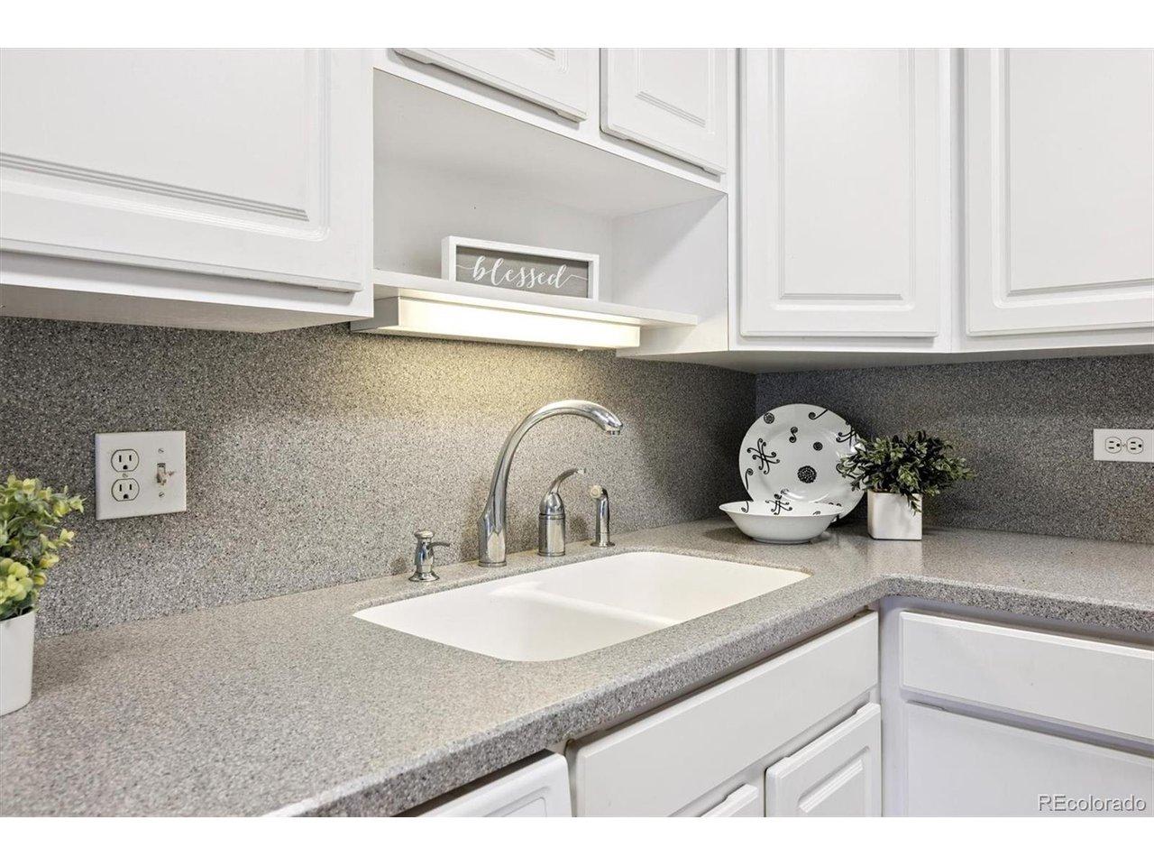 Image 2: Kitchen with updated cabinets/corian counters Image 2: Kitchen with updated cabinets/corian counters