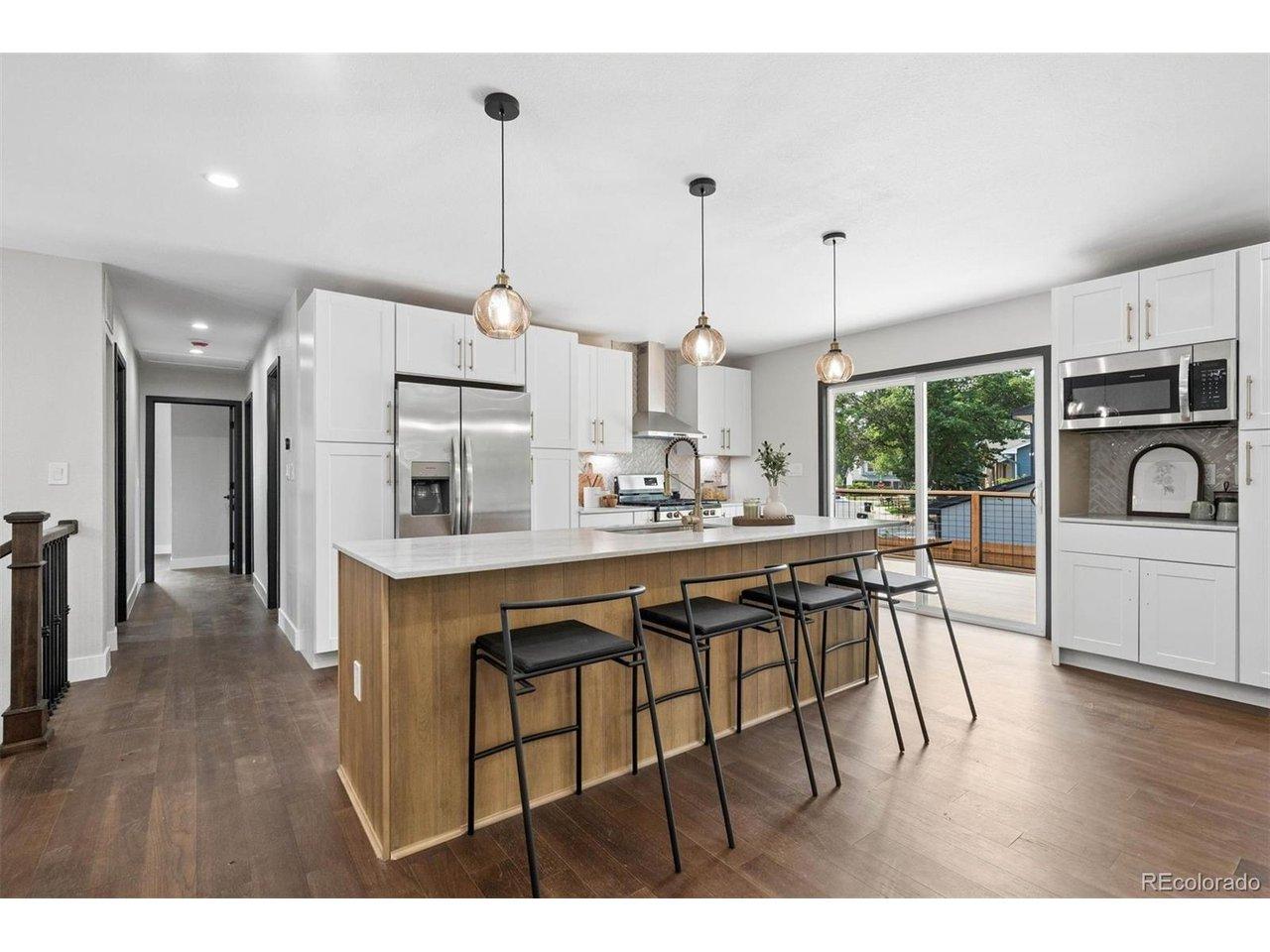 Image 1: Completely reimagined with high end and thoughtful finishes throughout. This home is truly 1 of 1