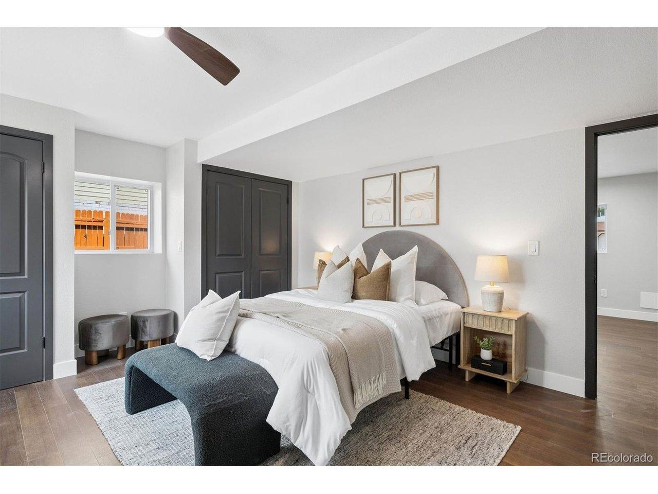 Image 4: Primary bedroom options on bottom or top level giving you versatility and the perfect opportunity for multi generational living