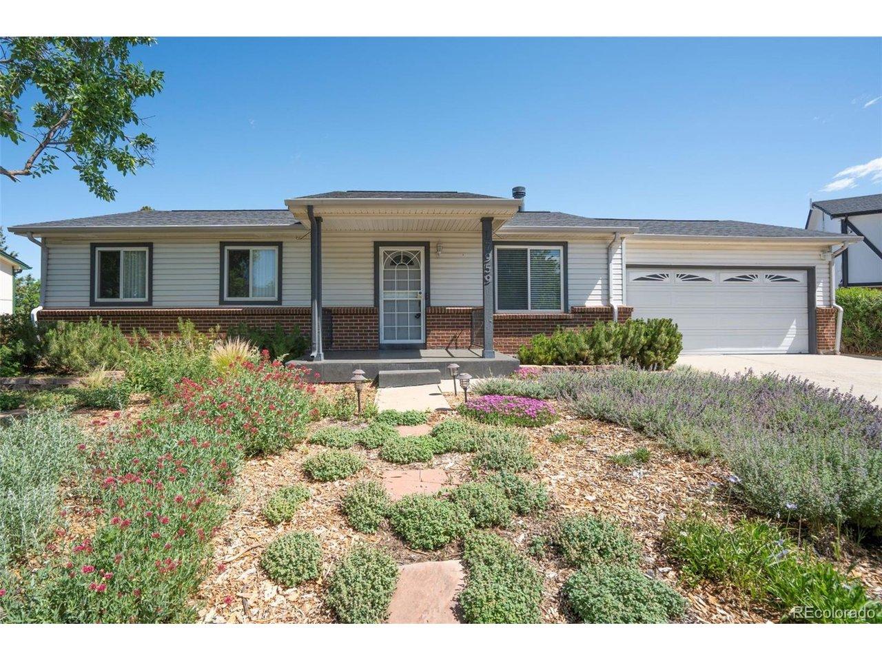 Image 2: Enjoy the xeriscpaed, low-maintenance front yard