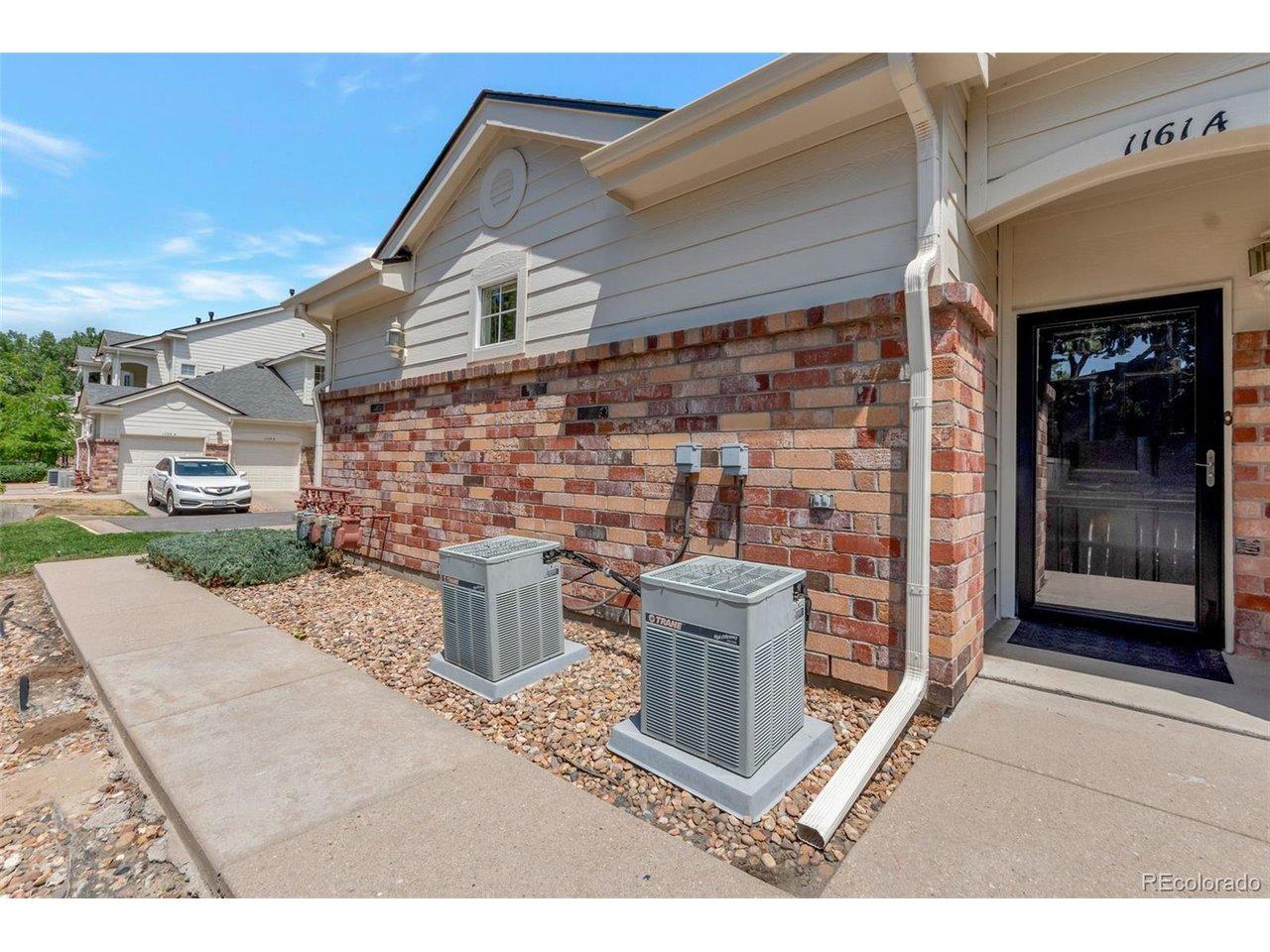 Image 1: Covered west-facing entry with security/storm door. Image 1: Covered west-facing entry with security/storm door.
