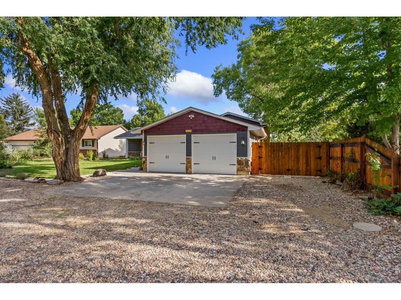 Image 4: A rare attached 4-car tandem garage offers exceptional space for vehicles, storage, or hobbies. Image 4: A rare attached 4-car tandem garage offers exceptional space for vehicles, storage, or hobbies.