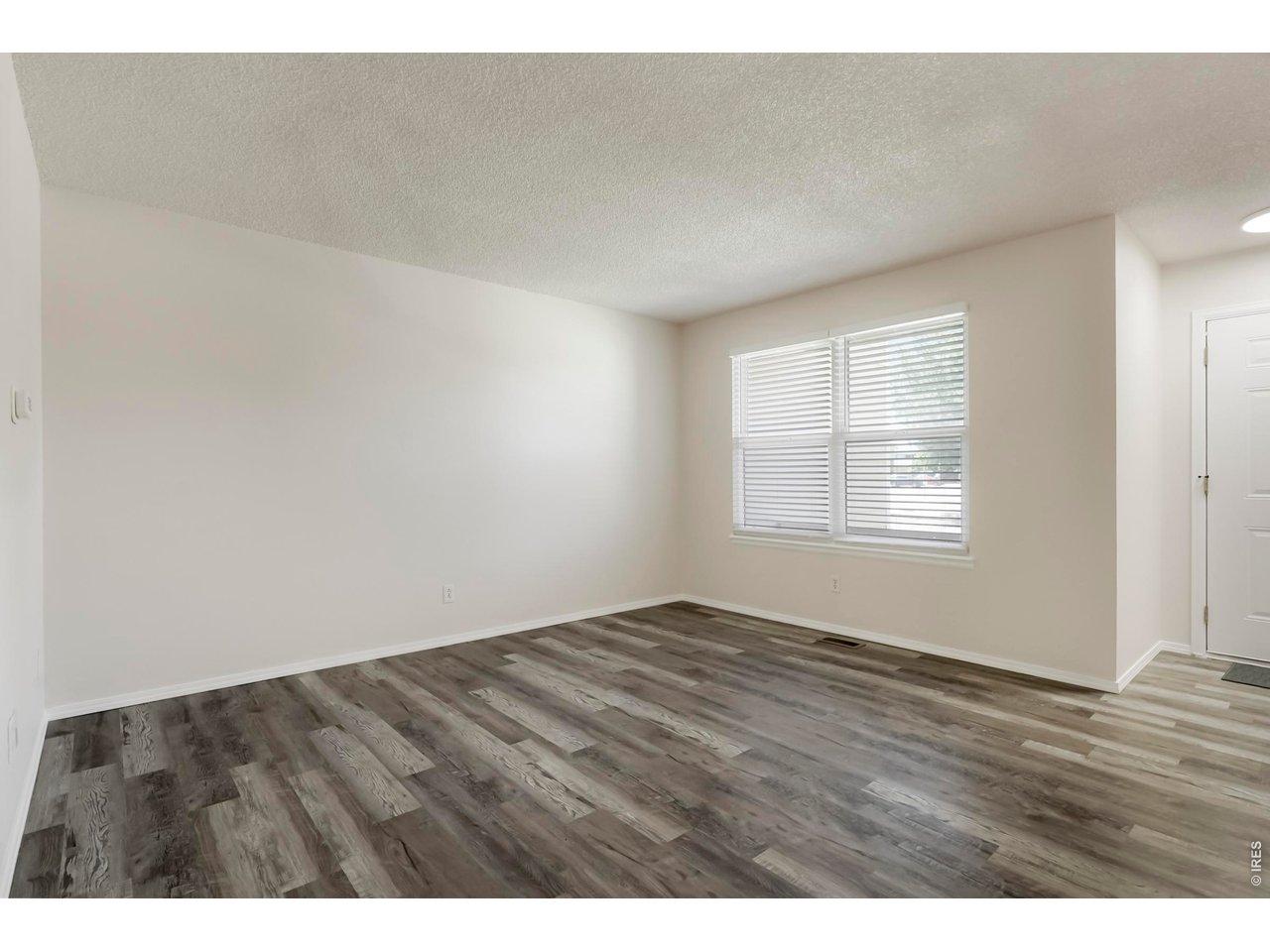 Image 4: Living Room with Large Windows Image 4: Living Room with Large Windows