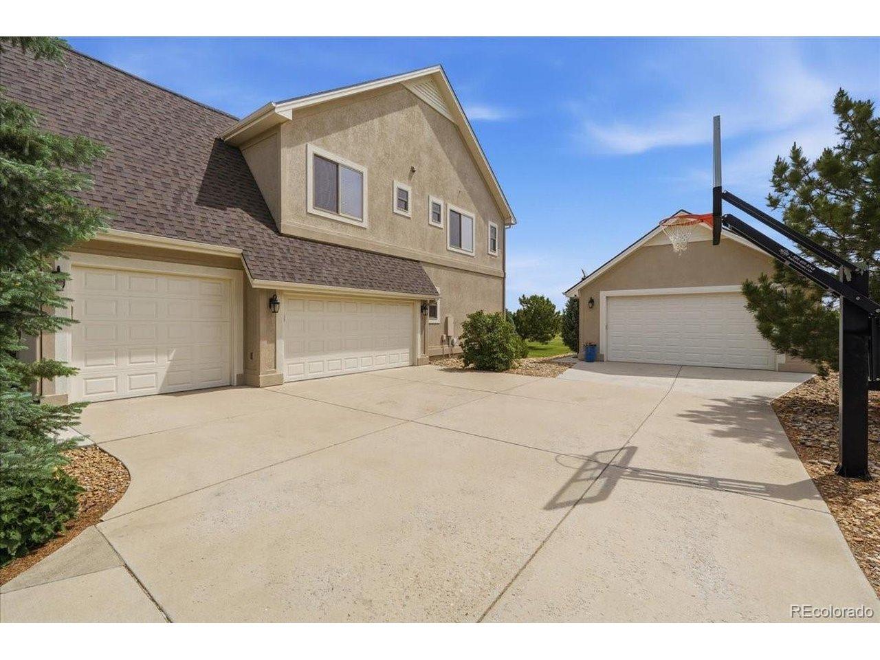 Image 3: Large attached 4 car garage PLUS additional detached shop with mini-split and room for all your toys