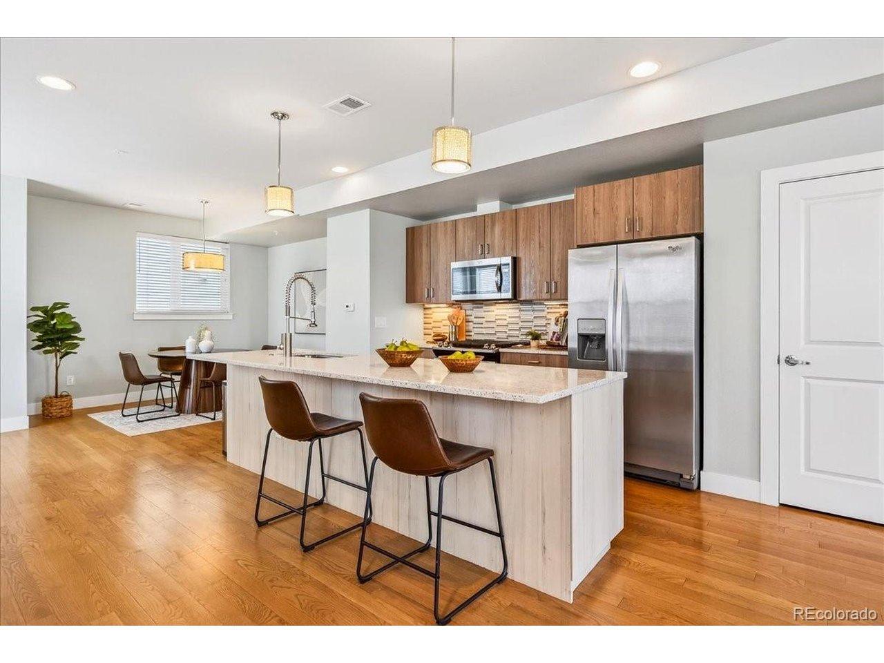 Image 2: Chef's kitchen with stainless steel appliances, pantry and Livia cabinets