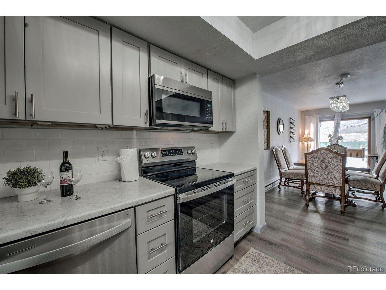 Image 4: kitchen looking to dining room