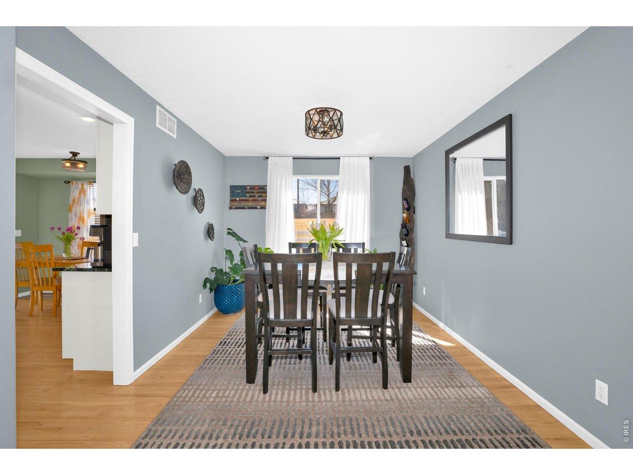 Image 4: Spacious formal dining room can also serve as a flex space!