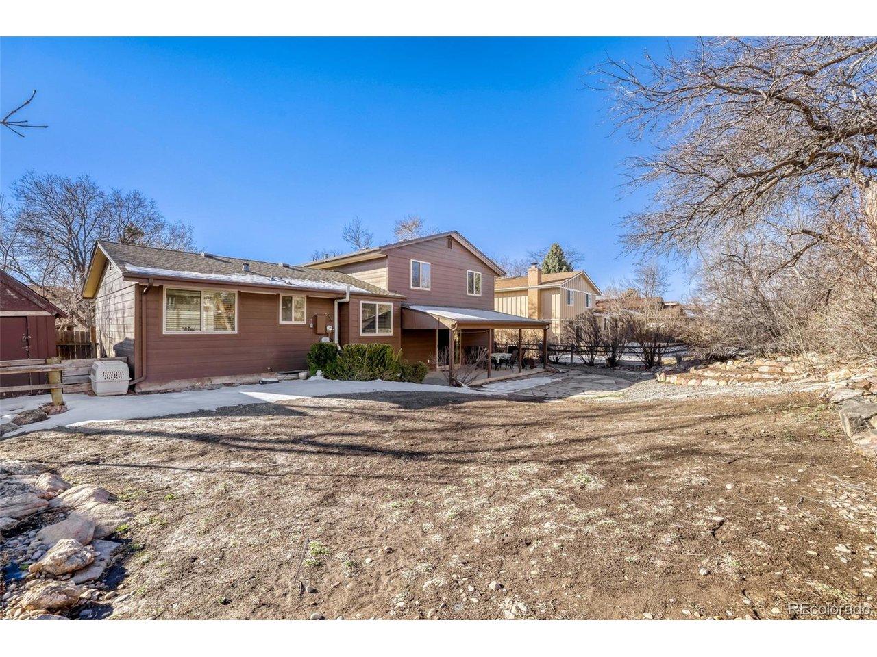 Image 3: Large, fenced private back yard. Covered patio. Storage shed.