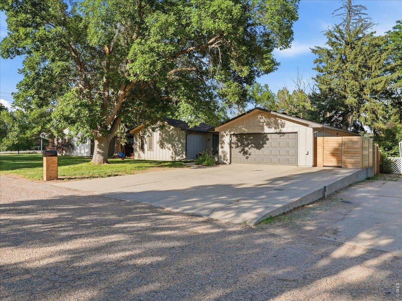 Image 2: A Two-Car Garage, plus RV or Boat Parking with accessible power outlets Image 2: A Two-Car Garage, plus RV or Boat Parking with accessible power outlets
