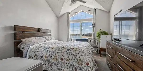 Image 4: Spacious bedroom with walk-in closet and views of Marston Lake Image 4: Spacious bedroom with walk-in closet and views of Marston Lake
