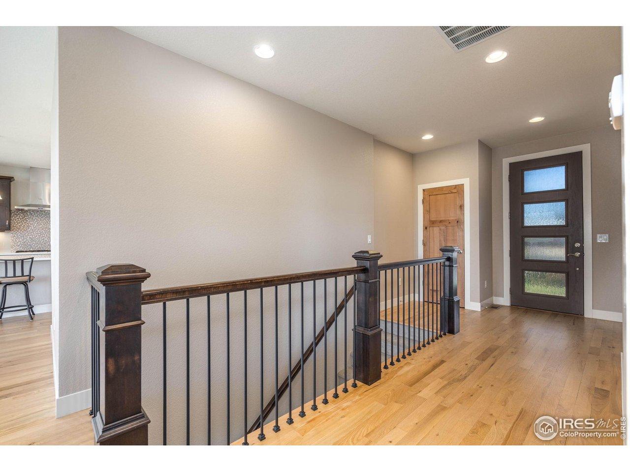 Image 4: Entryway with Hardwood Floors