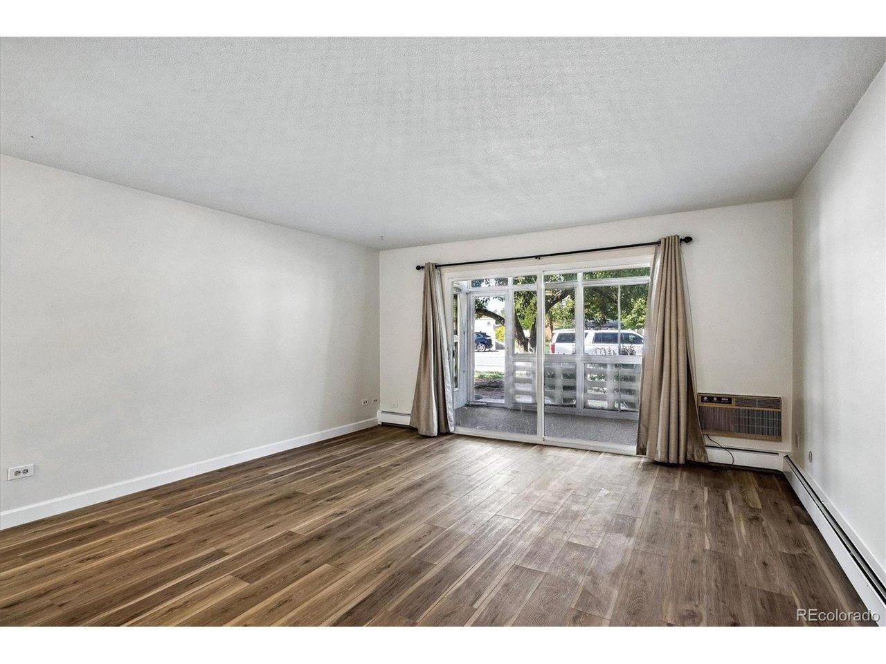 Image 4: Living room to patio. Image 4: Living room to patio.
