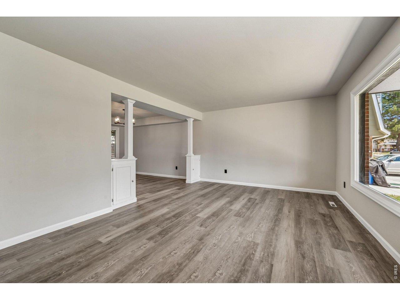 Image 3: Front living room with lots of natural light