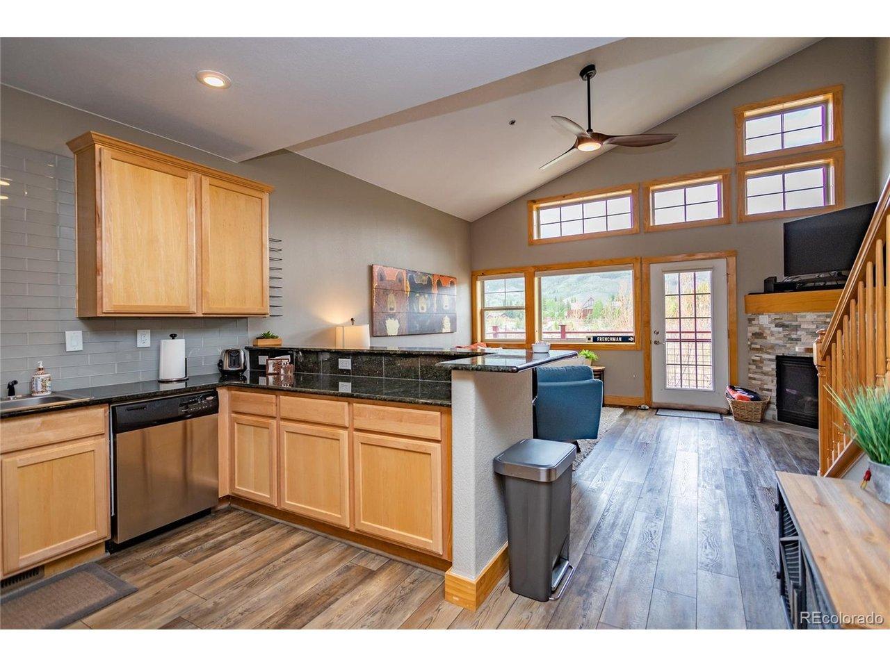 Image 4: Oversized Kitchen with Counter Bar and Stainless Steel Appliances Image 4: Oversized Kitchen with Counter Bar and Stainless Steel Appliances