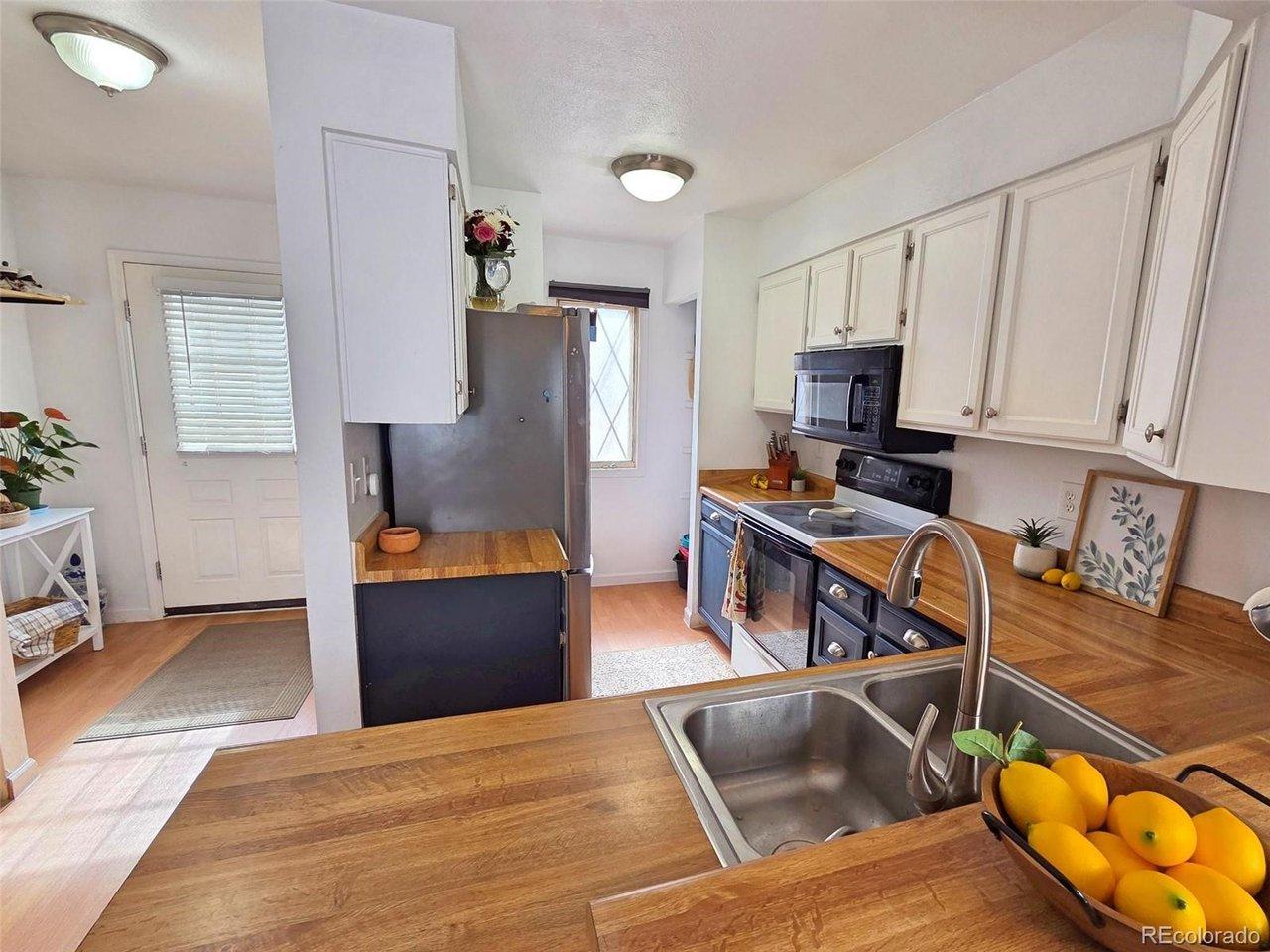 Image 2: Kitchen and entry