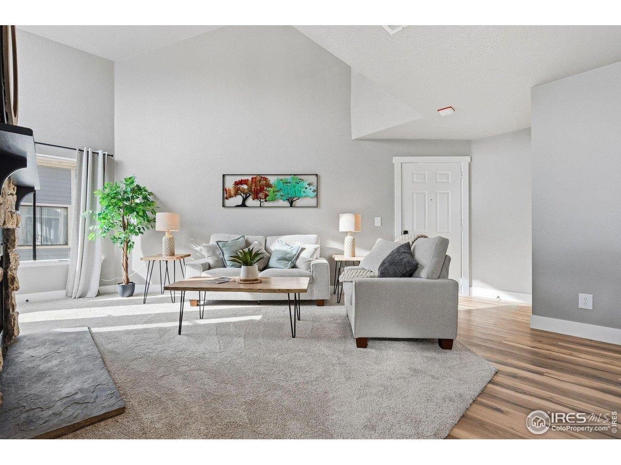 Image 4: Open and bright with soaring 2-story family room.