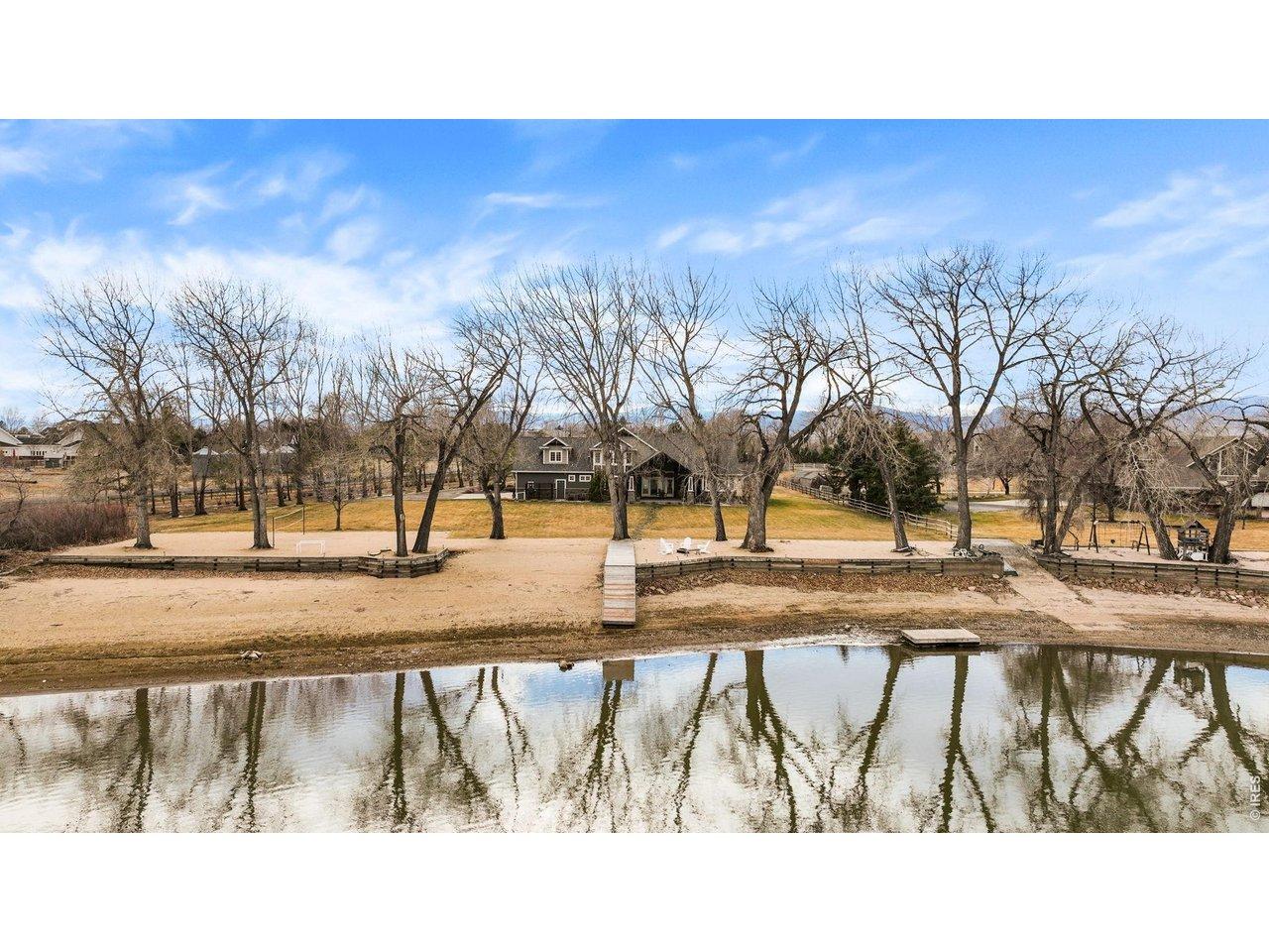 Image 2: Enjoy peaceful waterfront living with your own private dock and serene views right in the backyard