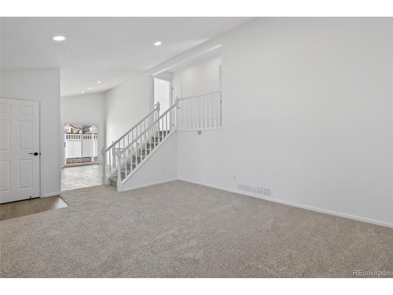 Image 2: Living room with vaulted ceilings and new can lighting