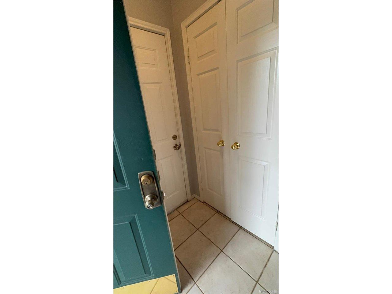 Image 4: Entry way with closet space leading to attached garage... Image 4: Entry way with closet space leading to attached garage...