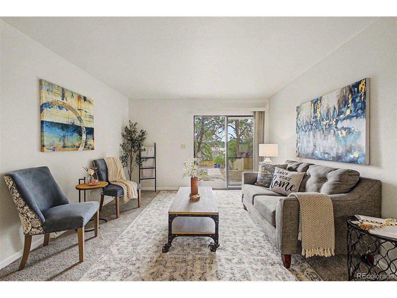 Image 1: Light and bright upstairs living room with slider out to patio Image 1: Light and bright upstairs living room with slider out to patio