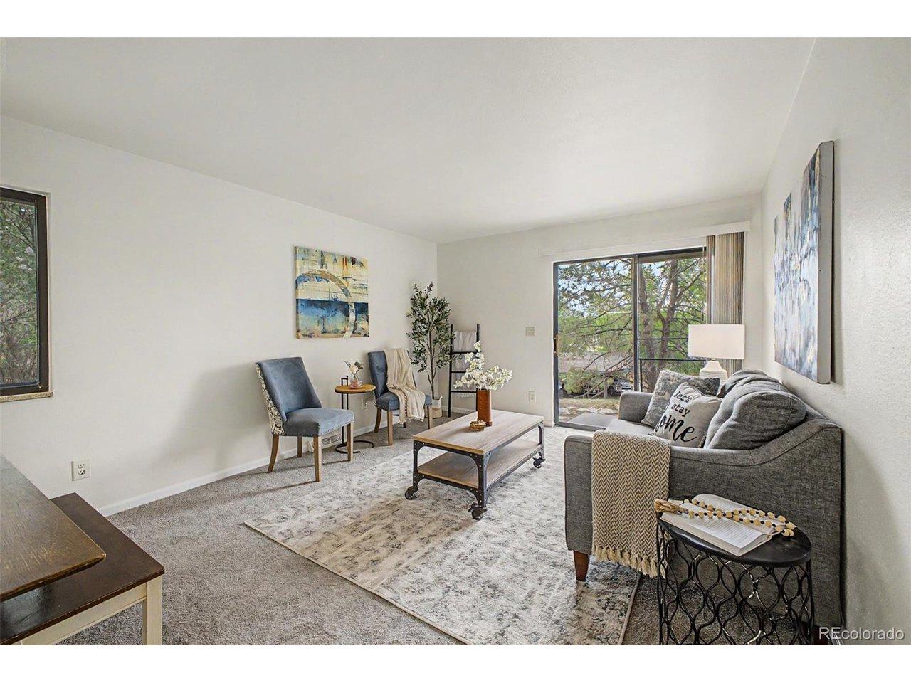 Image 3: Light and bright upstairs living room with slider out to patio Image 3: Light and bright upstairs living room with slider out to patio