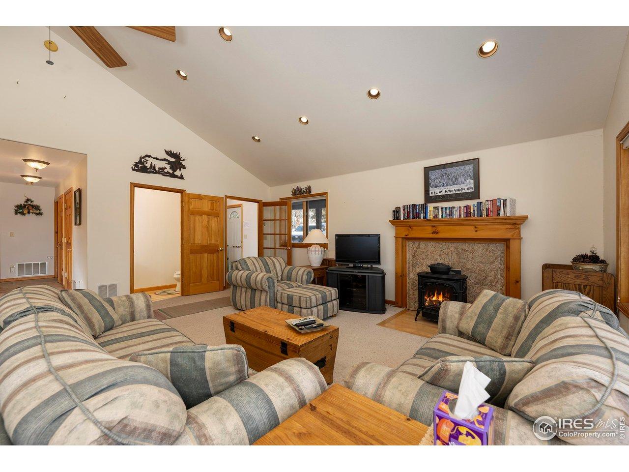 Image 2: Open Floor plan, living area, vaulted ceilings, gas fireplace