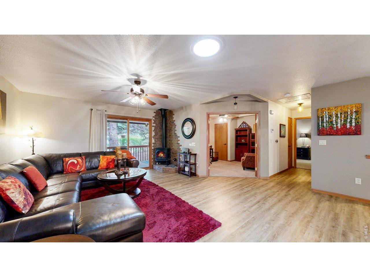 Image 3: Warm inviting living area with gas stove included Image 3: Warm inviting living area with gas stove included