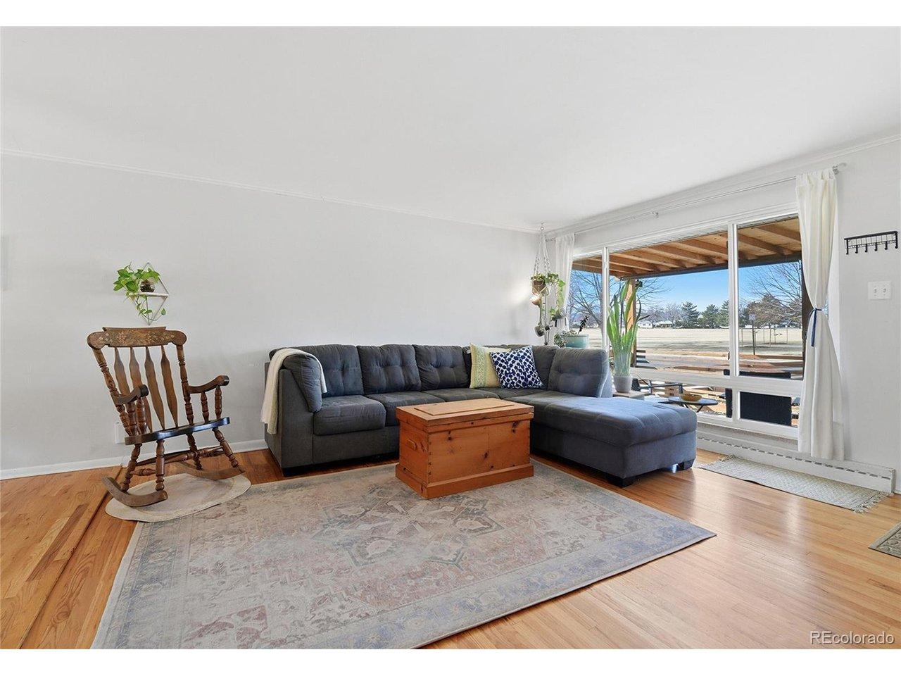 Image 4: Living room w/ park & mountain views!